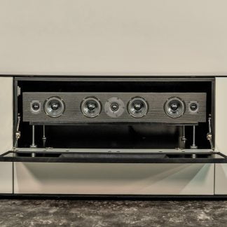 High-performance sound bar installed inside a custom AV cabinet with open front panel, showcasing advanced audio equipment and modern cabinetry.